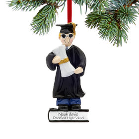 Personalized Graduate Boy on a Stack of Books Holding a Diploma Christmas Ornament