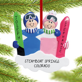 Personalized Ski Couple in Blue and Pink Christmas Ornament